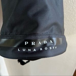 Prada women's black lightweight round shaped bag with drawstring closure